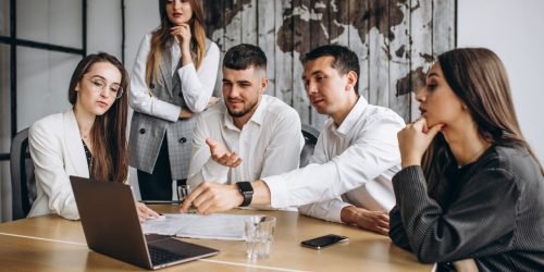 group-people-working-out-business-plan-office_1303-15866